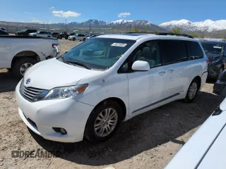2014 Toyota Sienna XLE z VIN 5TDYK3DC9ES463858, wystawiony jako Copart lot #53875535 z przebiegiem 143 694 mil mil oraz Szkoda całkowita • Salvage title. Historia ofert i sprzedaży dostępna na DreamBid. Obrazek 1.