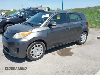2008 Scion xD with VIN JTKKU10458J014660, listed as a IAAI auction lot 42100828 with 136,436 mi miles. Bid and sale history available at carsss.com. Image 2.