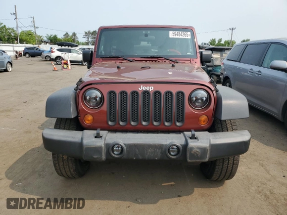 2007 Jeep Wrangler Unlimited X z VIN 1J4GA391X7L169728, wystawiony jako Copart lot #59484265 z przebiegiem 165 674 mil mil oraz Szkoda całkowita • Salvage title. Historia ofert i sprzedaży dostępna na DreamBid. Obrazek 5.