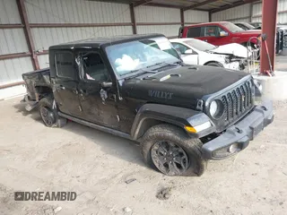2021 Jeep Gladiator Willys with VIN 1C6HJTAG8ML563161, listed as a IAAI auction lot 40311666 with 48,521 mi miles and . Bid and sale history available at DreamBid. Image 1.