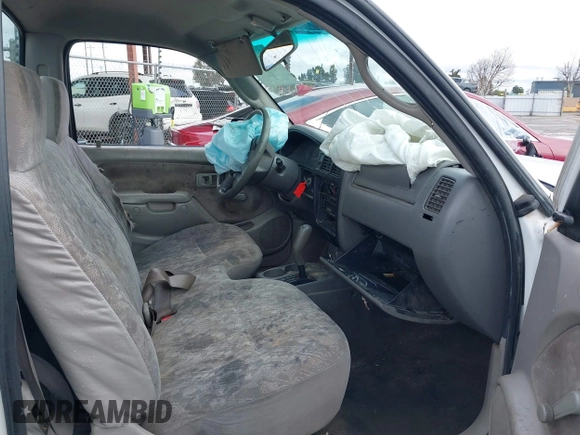 2002 Toyota Tacoma z VIN 5TENL42N02Z099046, wystawiony jako IAAI lot #41774946 z przebiegiem 189 134 mil mil oraz . Historia ofert i sprzedaży dostępna na DreamBid. Obrazek 5.