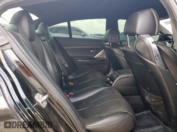 2016 BMW M6 with VIN WBS6E9C57GG437110, listed as a Copart auction lot 65406605 with 95,066 mi miles and Clean title. Bid and sale history available at DreamBid. Image 10.