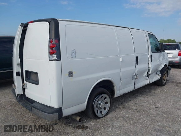 2014 Chevrolet Express Cargo Van with VIN 1GCSGAFX2E1121841, listed as a IAAI auction lot 42028712 with 164,768 mi miles. Bid and sale history available at carsss.com. Image 4.