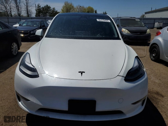 2023 Tesla Model Y Long Range z VIN 7SAYGDEE3PF772663, wystawiony jako Copart lot #56470455 z przebiegiem 50 705 mil mil oraz Czysty tytuł • Clean title. Historia ofert i sprzedaży dostępna na DreamBid. Obrazek 5.