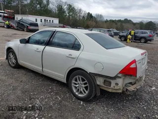 2011 Ford Fusion S with VIN 3FAHP0GA1BR337461, listed as a IAAI auction lot 41715964 with 219,486 mi miles. Bid and sale history available at carsss.com. Image 3.