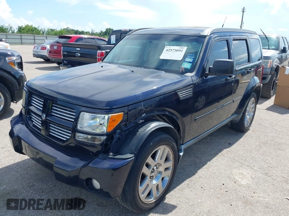 2011 Dodge Nitro Heat with VIN 1D4PT4GK1BW563775, listed as a IAAI auction lot 42573092 with 125,280 mi miles and . Bid and sale history available at DreamBid. Image 2.