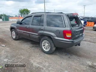 2002 Jeep Grand Cherokee Limited with VIN 1J8GW58N22C173250, listed as a IAAI auction lot 42480524 with 162,341 mi miles and . Bid and sale history available at DreamBid. Image 3.