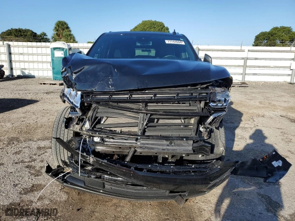 2023 Chevrolet Tahoe RST with VIN 1GNSCRKDXPR483465, listed as a Copart auction lot 77744604 with 11,078 mi miles and Salvage Title. Bid and sale history available at carsss.com. Image 5.