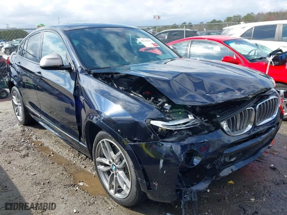 2018 BMW X4 M40i with VIN 5UXXW7C52J0W63809, listed as a IAAI auction lot 41715259 with NaN miles. Bid and sale history available at carsss.com. Image 6.