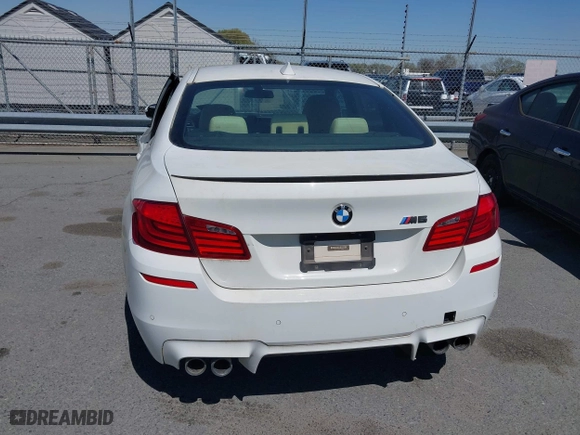 2013 BMW M5 with VIN WBSFV9C58DC773268, listed as a IAAI auction lot 41890830 with 128,399 mi miles. Bid and sale history available at carsss.com. Image 16.