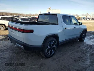 2023 Rivian R1T Adventure z VIN 7FCTGAAA9PN021913, wystawiony jako Copart lot #46222995 z przebiegiem 41 888 mil mil oraz Szkody całkowita. Historia ofert i sprzedaży dostępna na DreamBid. Obrazek 3.