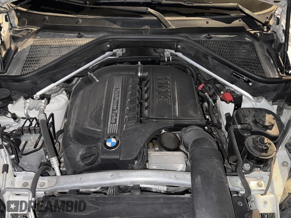 2014 BMW X6 xDrive35i with VIN 5UXFG2C58E0H09681, listed as a Copart auction lot 83922494 with 120,170 mi miles and Salvage Title. Bid and sale history available at carsss.com. Image 7.