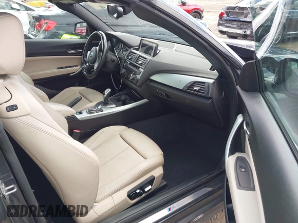2016 BMW 2 Series 228i xDrive with VIN WBA1L9C5XGV767324, listed as a IAAI auction lot 41795604 with 133,276 mi miles. Bid and sale history available at carsss.com. Image 5.
