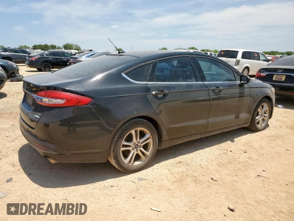 2018 Ford Fusion SE z VIN 3FA6P0HD5JR252718, wystawiony jako Copart lot #60549335 z przebiegiem 120 807 mil mil oraz Czysty tytuł • Clean title. Historia ofert i sprzedaży dostępna na DreamBid. Obrazek 3.