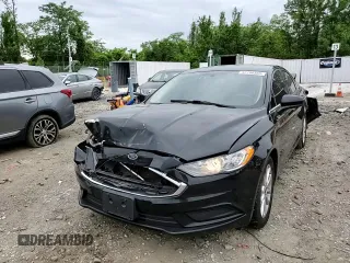 2017 Ford Fusion SE z VIN 3FA6P0HD6HR270896, wystawiony jako Copart lot #57796355 z przebiegiem 194 667 mil mil oraz Szkoda całkowita • Salvage title. Historia ofert i sprzedaży dostępna na DreamBid. Obrazek 13.