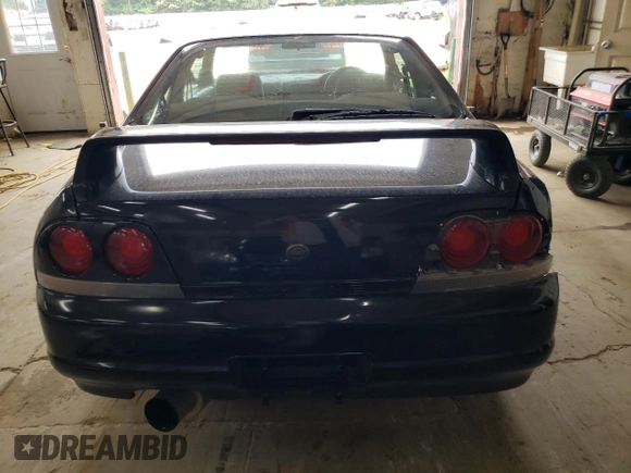 1997 Nissan Skyline z VIN HR33101590, wystawiony jako Copart lot #68650354 z przebiegiem 76 082 mil mil oraz Szkoda całkowita • Salvage title. Historia ofert i sprzedaży dostępna na DreamBid. Obrazek 6.