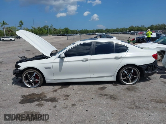 2014 BMW 5 Series 535i xDrive with VIN WBA5B3C56ED536747, listed as a IAAI auction lot 41900220 with 132,757 mi miles and . Bid and sale history available at carsss.com. Image 15.