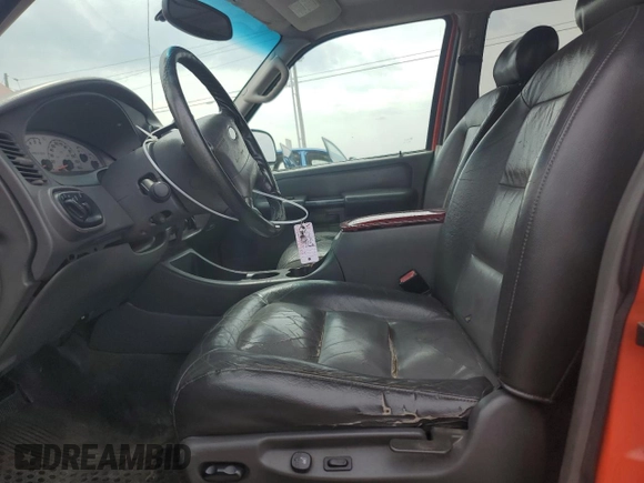 2004 Ford Explorer Sport Trac XLS z VIN 1FMDU77K94UA77644, wystawiony jako Copart lot #57495175 z przebiegiem Nie podano mil oraz Czysty tytuł • Clean title. Historia ofert i sprzedaży dostępna na DreamBid. Obrazek 7.