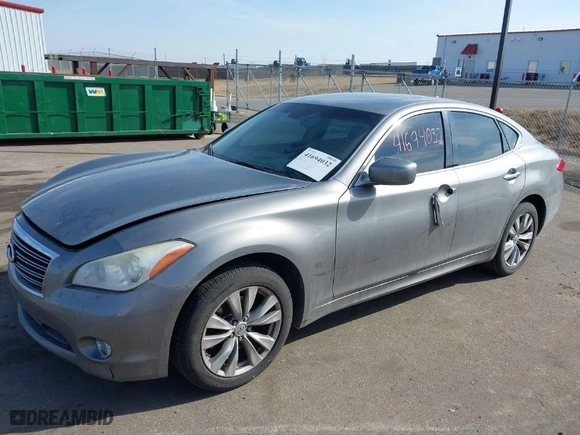 2012 Infiniti M37 with VIN JN1BY1AR9CM396580, listed as a IAAI auction lot 41694032 with 137,197 mi miles. Bid and sale history available at carsss.com. Image 2.