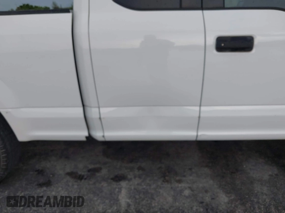 2015 Ford F-150 XL with VIN 1FTEX1CP7FFB56879, listed as a IAAI auction lot 42414408 with 212,042 mi miles and . Bid and sale history available at DreamBid. Image 17.