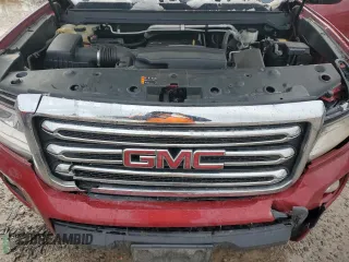 2018 GMC Canyon z VIN 1GTH6CEA3J1220524, wystawiony jako Copart lot #83235194 z przebiegiem 61 366 mil mil oraz Szkoda całkowita • Salvage title. Historia ofert i sprzedaży dostępna na DreamBid. Obrazek 11.