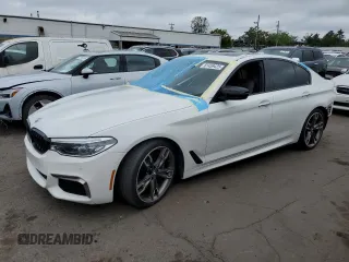 2018 BMW 5 Series M550i xDrive with VIN WBAJB9C5XJB035996, listed as a Copart auction lot 61459425 with Not provided miles and Salvage title. Bid and sale history available at DreamBid. Image 1.