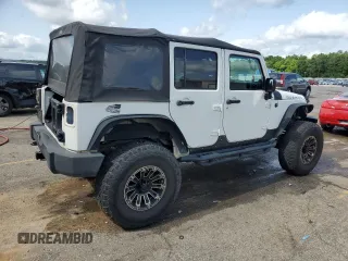 2010 Jeep Wrangler Unlimited Rubicon with VIN 1J4BA6H10AL176014, listed as a Copart auction lot 57092255 with 138,253 mi miles and Salvage title. Bid and sale history available at DreamBid. Image 3.
