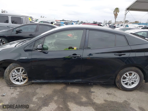2019 Toyota Prius L Eco with VIN JTDKARFU6K3074058, listed as a IAAI auction lot 41741499 with 70,834 mi miles. Bid and sale history available at carsss.com. Image 14.