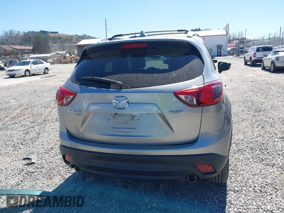 2014 Mazda CX-5 Grand Touring with VIN JM3KE4DY3E0368169, listed as a IAAI auction lot 41857976 with 127,853 mi miles. Bid and sale history available at carsss.com. Image 16.