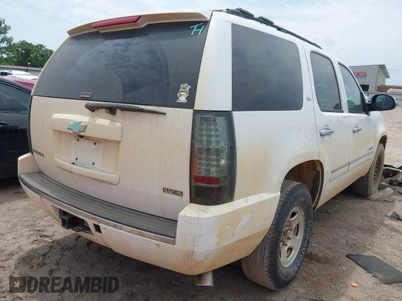 2012 Chevrolet Tahoe LTZ with VIN 1GNSCCE00CR197950, listed as a IAAI auction lot 42393693 with 296,161 mi miles and . Bid and sale history available at DreamBid. Image 4.