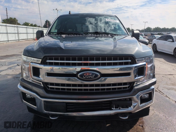 2019 Ford F-150 XL with VIN 1FTEW1E53KFB57102, listed as a Copart auction lot 61633055 with 86,949 mi miles and Salvage title. Bid and sale history available at DreamBid. Image 5.