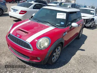 2009 MINI Hardtop S with VIN WMWMF73569TW86229, listed as a IAAI auction lot 42264383 with 63,482 mi miles and . Bid and sale history available at DreamBid. Image 2.