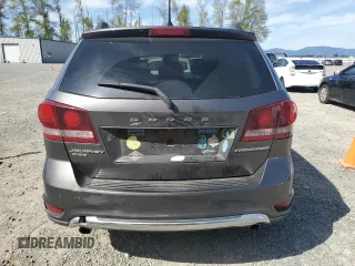 2017 Dodge Journey Crossroad Plus z VIN 3C4PDDGG6HT567454, wystawiony jako Copart lot #53249225 z przebiegiem 189 647 mil mil oraz Szkoda całkowita • Salvage title. Historia ofert i sprzedaży dostępna na DreamBid. Obrazek 6.