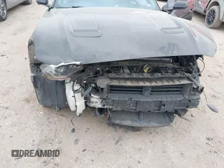 2020 Ford Mustang EcoBoost with VIN 1FA6P8TH3L5105814, listed as a IAAI auction lot 41778304 with 63,771 mi miles. Bid and sale history available at carsss.com. Image 6.