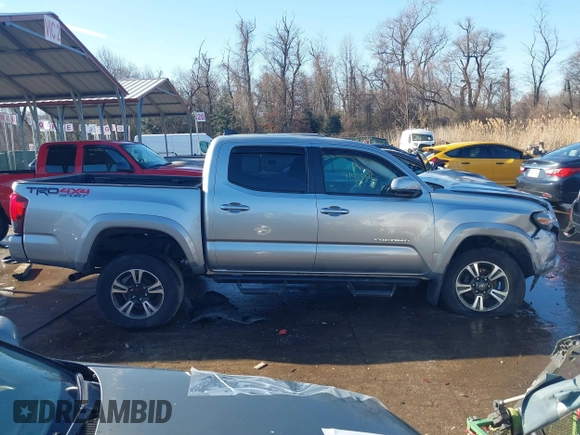 2018 Toyota Tacoma SR with VIN 5TFCZ5AN3JX151479, listed as a IAAI auction lot 41428376 with 104,717 mi miles. Bid and sale history available at carsss.com. Image 13.