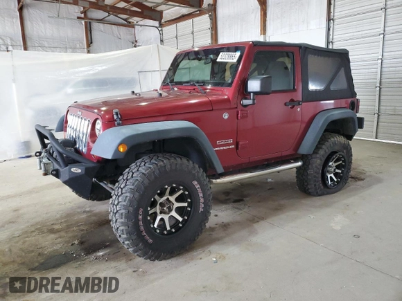 2012 Jeep Wrangler Sport with VIN 1C4AJWAG5CL233049, listed as a Copart auction lot 52328865 with 185,388 mi miles and Salvage title. Bid and sale history available at DreamBid. Image 1.