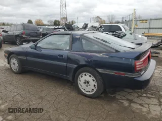1988 Toyota Supra z VIN JT2MA71J0J0087102, wystawiony jako Copart lot #78730904 z przebiegiem 83 787 mil mil oraz Czysty tytuł • Clean title. Historia ofert i sprzedaży dostępna na DreamBid. Obrazek 2.