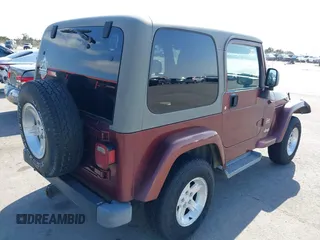 2004 Jeep Wrangler Sahara with VIN 1J4FA59S24P739581, listed as a IAAI auction lot 41696146 with 232,139 mi miles and . Bid and sale history available at DreamBid. Image 4.