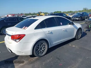 2014 Chevrolet Cruze 2LT z VIN 1G1PE5SB4E7340318, wystawiony jako IAAI lot #42268044 z przebiegiem Nie podano mil oraz . Historia ofert i sprzedaży dostępna na DreamBid. Obrazek 4.