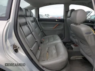 2000 Volkswagen Passat z VIN WVWPD23B0YP431209, wystawiony jako Copart lot #84954554 z przebiegiem 149 382 mil mil oraz Szkoda całkowita • Salvage title. Historia ofert i sprzedaży dostępna na DreamBid. Obrazek 10.