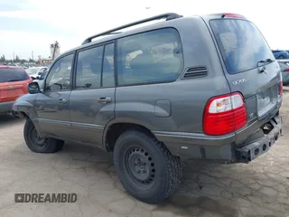 2001 Lexus LX 470 z VIN JTJHT00WX13509489, wystawiony jako IAAI lot #42227083 z przebiegiem 360 283 mil mil oraz . Historia ofert i sprzedaży dostępna na DreamBid. Obrazek 3.