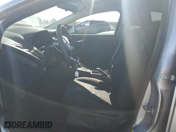 2018 Ford Focus SE with VIN 1FADP3FE4JL308909, listed as a Copart auction lot 61489005 with 58,613 mi miles and Salvage title. Bid and sale history available at DreamBid. Image 7.