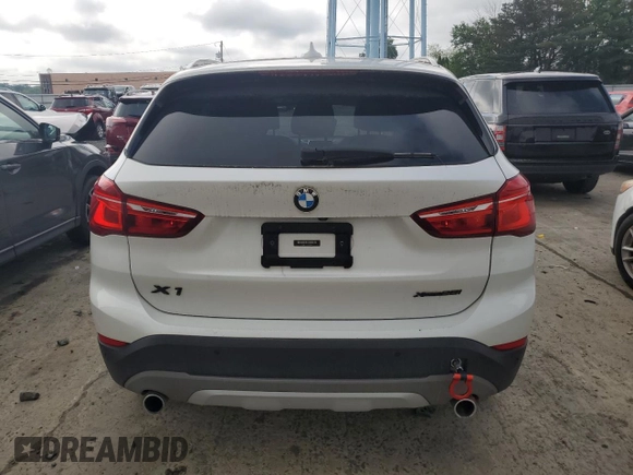 2019 BMW X1 xDrive28i with VIN WBXHT3C52K3H34021, listed as a Copart auction lot 64032535 with 30,752 mi miles and Salvage title. Bid and sale history available at DreamBid. Image 6.