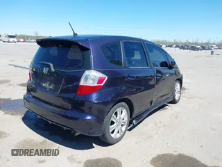 2009 Honda Fit Sport with VIN JHMGE88479S007307, listed as a IAAI auction lot 41801827 with 212,998 mi miles. Bid and sale history available at carsss.com. Image 4.