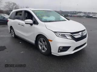 2020 Honda Odyssey EX-L with VIN 5FNRL6H78LB031411, listed as a IAAI auction lot 41027726 with 55,586 mi miles. Bid and sale history available at carsss.com. Image 1.