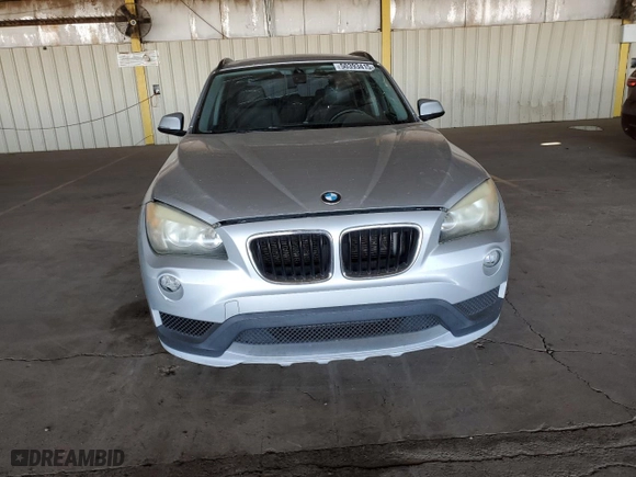 2015 BMW X1 sDrive28i with VIN WBAVM1C57FVW57426, listed as a Copart auction lot 50393415 with 220,617 mi miles and Clean Title. Bid and sale history available at carsss.com. Image 5.