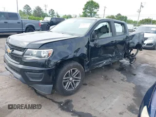 2020 Chevrolet Colorado 4WD Work Truck z VIN 1GCGTBEN0L1134432, wystawiony jako IAAI lot #42097672 z przebiegiem 104 946 mil mil oraz . Historia ofert i sprzedaży dostępna na DreamBid. Obrazek 2.