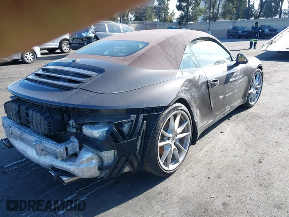 2012 Porsche 911 Carrera S with VIN WP0CB2A98CS154934, listed as a IAAI auction lot 41871101 with 69,411 mi miles and . Bid and sale history available at DreamBid. Image 4.