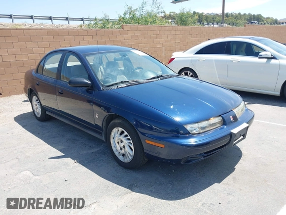 1998 Saturn SL z VIN 1G8ZK5270WZ174447, wystawiony jako IAAI lot #42543578 z przebiegiem 137 326 mil mil oraz . Historia ofert i sprzedaży dostępna na DreamBid. Obrazek 1.