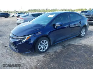 2024 Toyota Corolla Hybrid LE with VIN JTDBCMFE4RJ021466, listed as a IAAI auction lot 41976149 with 21,965 mi miles. Bid and sale history available at carsss.com. Image 2.